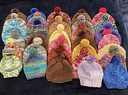 Sue Finzel Martin made all these hats for Silver Lake School